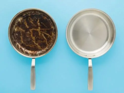 Limpieza de una sartén de acero inoxidable sucia