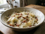 White cabbage salad with bacon and Comté cheese