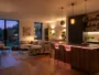 Decorative pink neon light above a worktop in a modern kitchen