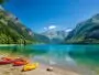 Turquoise alpine lake surrounded by mountains in Savoie during the summer