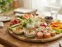 Cold appetizer platter with verrines, smoked salmon rolls, hummus and crudités, ready to serve